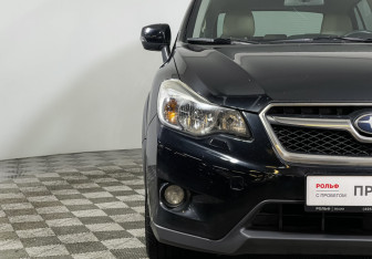 Подержанный автомобиль Subaru XV 2014 года (16 фото)
