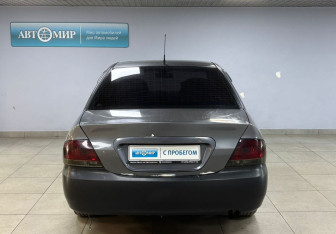 Подержанный автомобиль Mitsubishi Lancer Sedan 2009 года (6 фото)