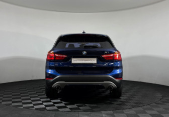 Подержанный автомобиль BMW X1 2015 года (4 фото)