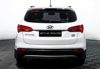 Подержанный автомобиль Hyundai Santa Fe 2014 года (4 фото)