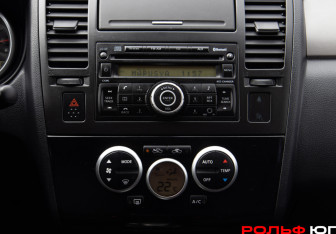 Подержанный автомобиль Nissan Tiida Sedan 2011 года (15 фото)