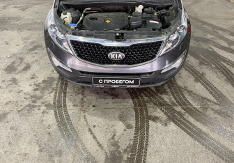Подержанный автомобиль Kia Sportage 2014 года (18 фото)
