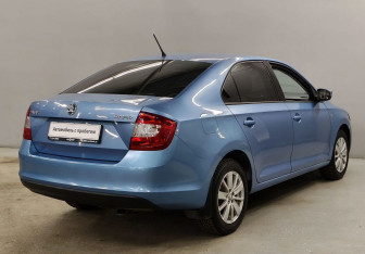 Подержанный автомобиль Skoda Rapid Liftback 2014 года (5 фото)