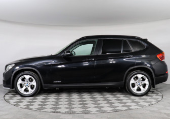 Подержанный автомобиль BMW X1 2014 года (5 фото)