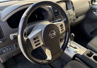 Подержанный автомобиль Nissan Pathfinder 2012 года (15 фото)