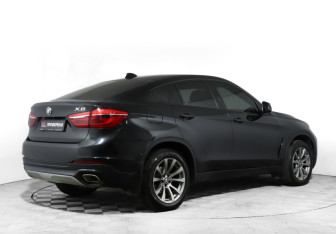 Подержанный автомобиль BMW X6 2015 года (5 фото)