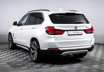 Подержанный автомобиль BMW X5 2014 года (7 фото)