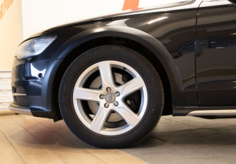 Подержанный автомобиль Audi A6 allroad 2014 года (37 фото)