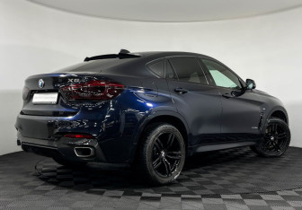 Подержанный автомобиль BMW X6 2018 года (2 фото)
