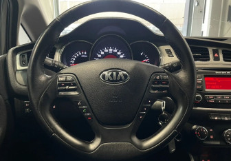 Подержанный автомобиль Kia Ceed Wagon 2014 года (14 фото)