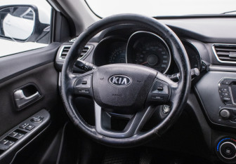 Подержанный автомобиль Kia Rio Sedan 2014 года (14 фото)
