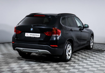 Подержанный автомобиль BMW X1 2013 года (5 фото)
