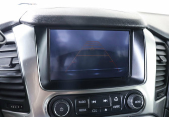 Подержанный автомобиль Chevrolet Tahoe 2015 года (13 фото)