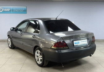Подержанный автомобиль Mitsubishi Lancer Sedan 2009 года (7 фото)