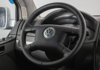 Подержанный автомобиль Volkswagen Multivan 2004 года (14 фото)