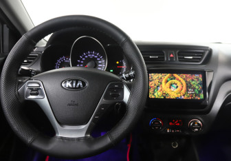 Подержанный автомобиль Kia Rio Sedan 2015 года (3 фото)