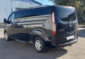 Подержанный автомобиль Ford Tourneo Custom 2014 года (7 фото)