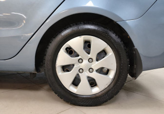 Подержанный автомобиль Kia Rio Sedan 2015 года (9 фото)