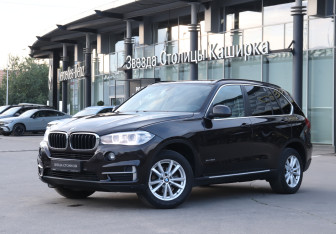 Подержанный автомобиль BMW X5 2014 года (21 фото)