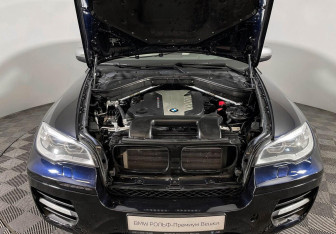 Подержанный автомобиль BMW X6 2013 года (10 фото)