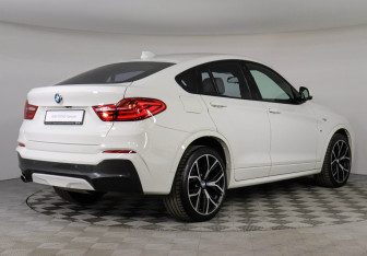 Подержанный автомобиль BMW X4 2015 года (2 фото)
