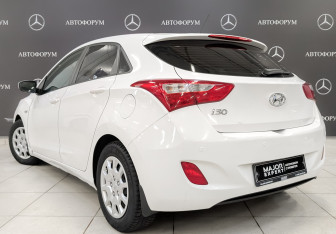 Подержанный автомобиль Hyundai i30 Hatchback 2014 года (7 фото)