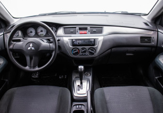 Подержанный автомобиль Mitsubishi Lancer Sedan 2009 года (13 фото)