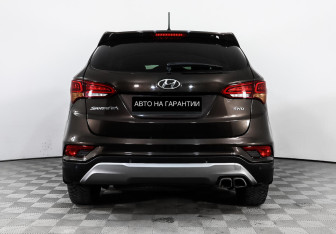 Подержанный автомобиль Hyundai Santa Fe 2016 года (4 фото)