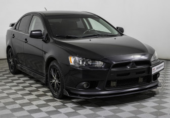 Подержанный автомобиль Mitsubishi Lancer Sedan 2012 года (3 фото)