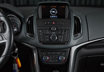 Подержанный автомобиль Opel Zafira Minivan 2013 года (19 фото)