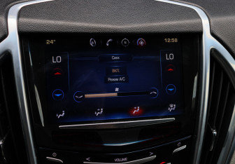 Подержанный автомобиль Cadillac SRX 2014 года (19 фото)