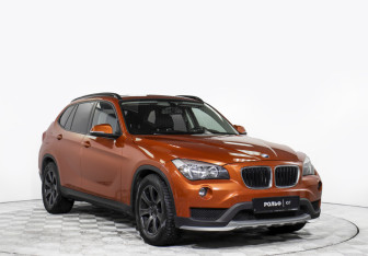 Подержанный автомобиль BMW X1 2014 года (3 фото)
