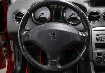 Подержанный автомобиль Peugeot 308 Hatchback 2009 года (13 фото)