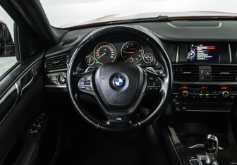 Подержанный автомобиль BMW X4 2015 года (12 фото)