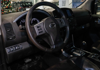 Подержанный автомобиль Nissan Pathfinder 2010 года (14 фото)