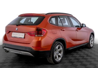 Подержанный автомобиль BMW X1 2014 года (5 фото)