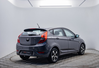 Подержанный автомобиль Hyundai Solaris Hatchback 2013 года (5 фото)