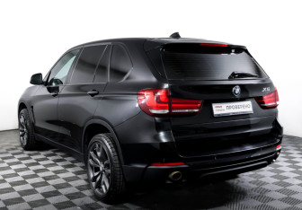 Подержанный автомобиль BMW X5 2014 года (7 фото)