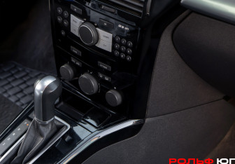 Подержанный автомобиль Opel Astra Sedan 2011 года (13 фото)