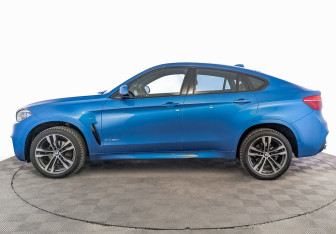 Подержанный автомобиль BMW X6 2018 года (8 фото)
