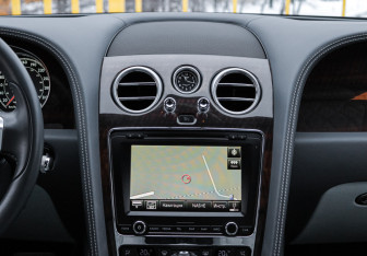 Подержанный автомобиль Bentley Flying Spur 2014 года (11 фото)