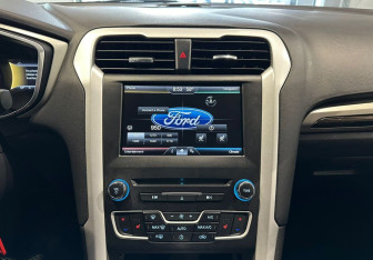 Подержанный автомобиль Ford Fusion (North America) 2015 года (16 фото)