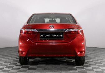 Подержанный автомобиль Toyota Corolla Sedan 2014 года (4 фото)
