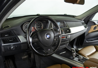 Подержанный автомобиль BMW X5 2009 года (9 фото)