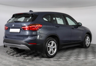 Подержанный автомобиль BMW X1 2016 года (2 фото)