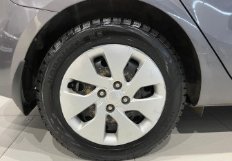 Подержанный автомобиль Kia Rio Sedan 2015 года (10 фото)