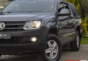 Подержанный автомобиль Volkswagen Amarok 2012 года (23 фото)