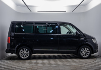 Подержанный автомобиль Volkswagen Multivan 2015 года (4 фото)