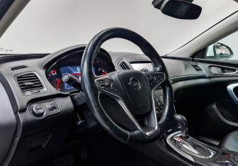 Подержанный автомобиль Opel Insignia Wagon 2014 года (15 фото)