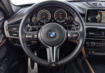 Подержанный автомобиль BMW X6 M 2016 года (22 фото)
